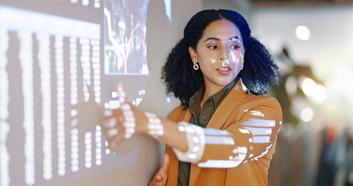 presentation-projector-and-business-woman-report-2025-04-06-03-32-13-utc 1200 (1)
